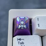 A Virtual YouTuber: Ninomae Ina'Nis Keycaps with a rich purple metallic luster, highlighting its sleek modern design and premium finish.