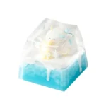 Handcrafted artisan resin Ice World keycap display, featuring a whimsical miniature ice world diorama.