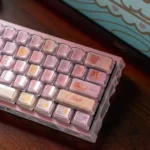 Whimsical rabbit tea party keycap set collection. Pastel pink custom mechanical keycaps with adorable bunnies and delicate teacups. Playful design.