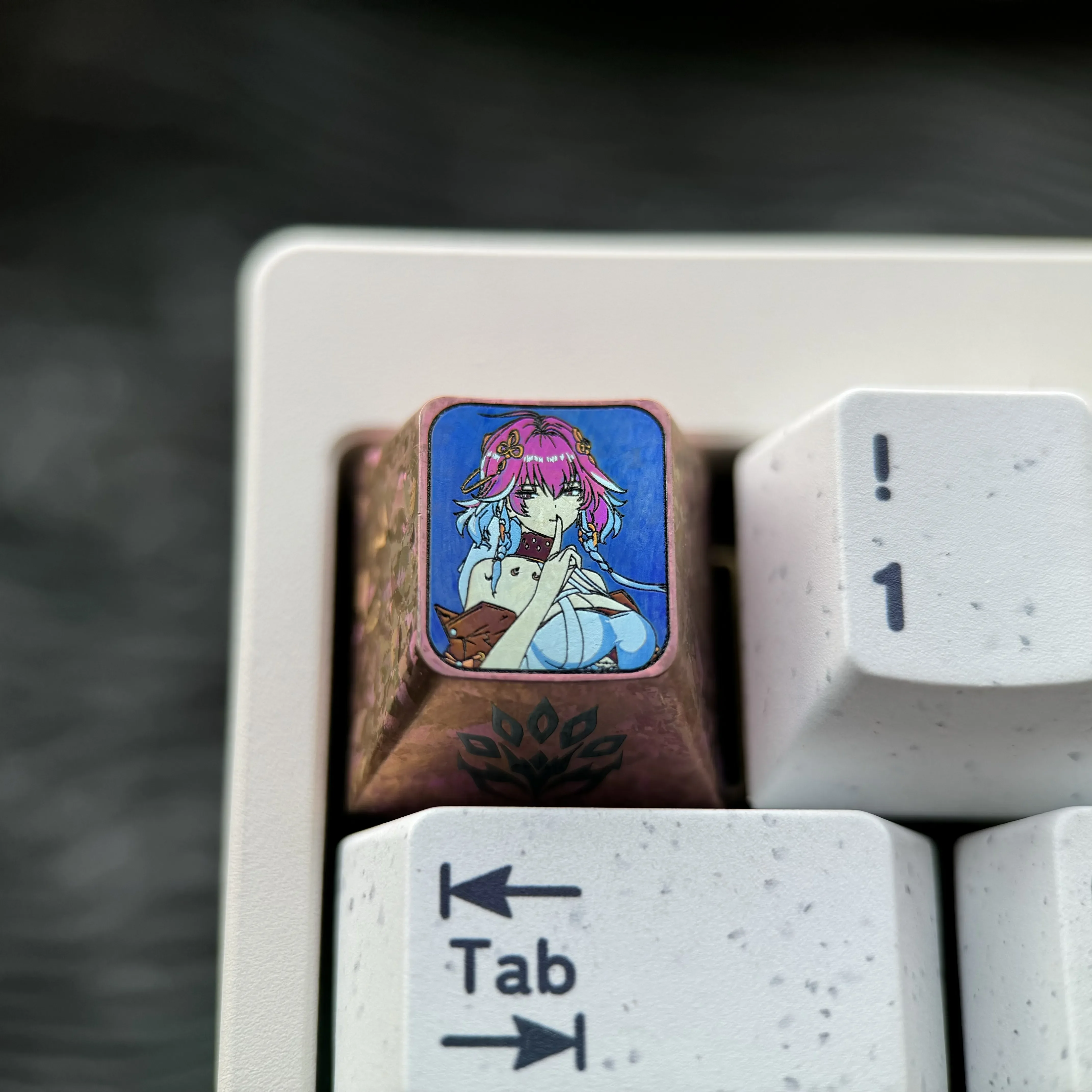 Wuthering Waves: Changli Titanium Keycap, a custom metal ESC keycap showcasing intricate fantasy patterns on polished titanium alloy.