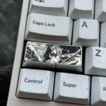 Lustrous precision-engraved titanium keycap, showcasing intricate, vibrant artwork that elevates keyboard artistry.