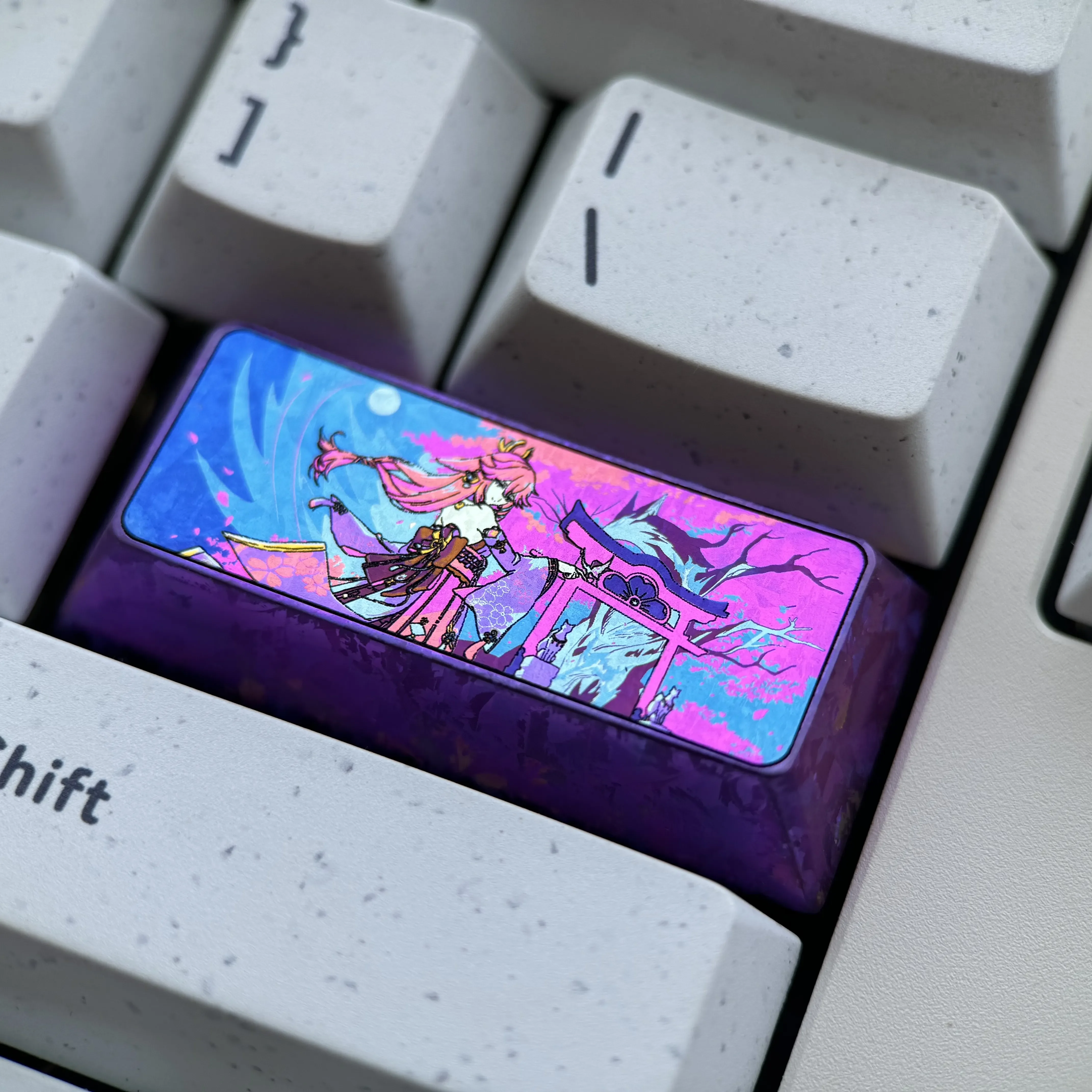 Explore gallery views of the exquisite Yae Miko titanium alloy keycap, showcasing intricate Genshin Impact anime art and its polished, premium finish.