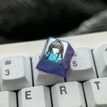 Multiple views of the exclusive Yukino Titanium Anime Keycap, showcasing its vibrant anime character illustration and polished titanium finish.