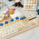 Yummy Delightful Cute PBT Keycaps Set, highlighting durable 5-sided dye-sublimation and playful food-inspired designs for a whimsical desktop.