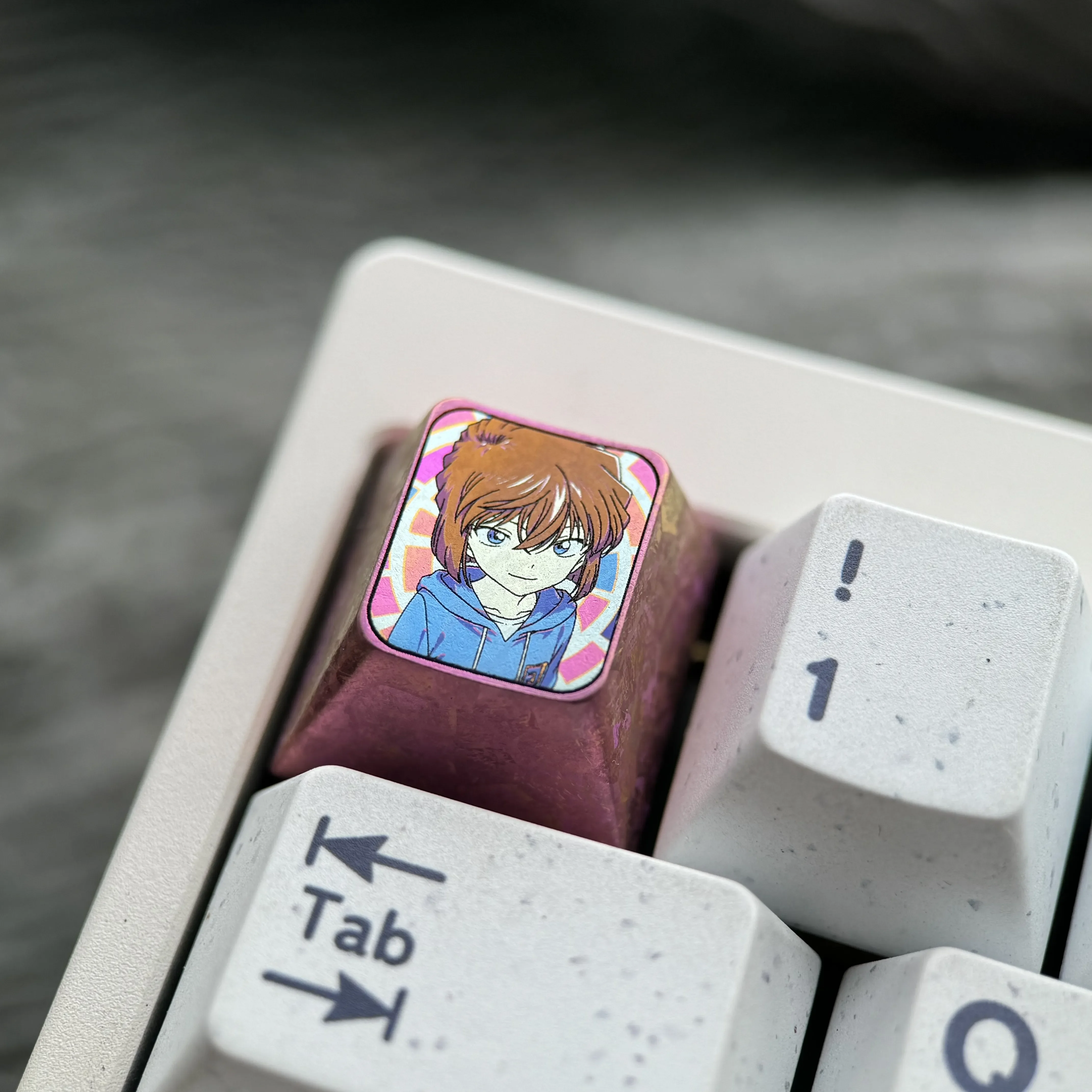 Multiple views of the premium Ai Haibara titanium ESC keycap, highlighting its vibrant anime illustration and exquisite metallic craftsmanship.