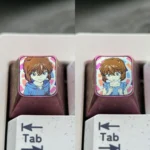 Vibrant Ai Haibara titanium ESC keycap for mechanical keyboards, showcasing premium craftsmanship and detailed anime art.