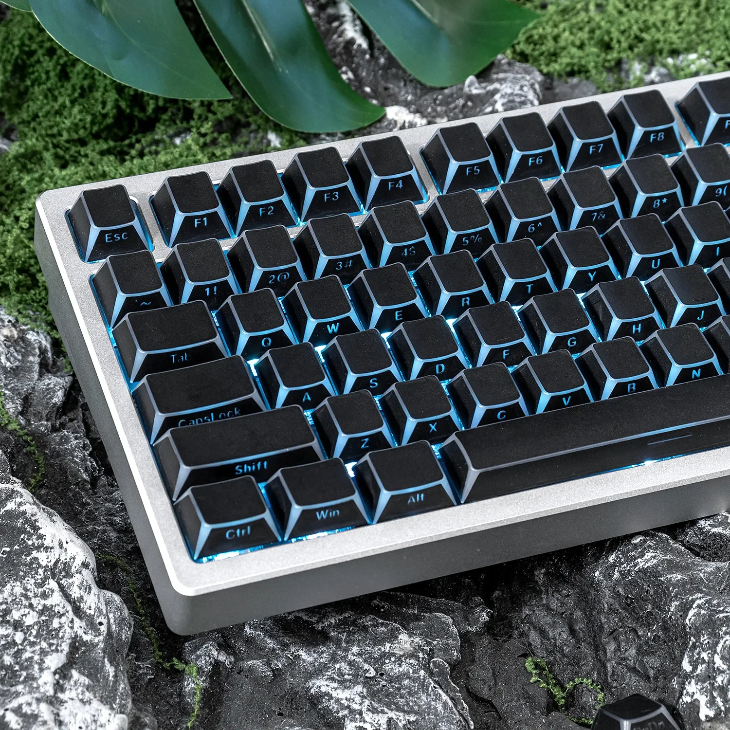 Full custom set of Angular Shadow Black PBT double-shot side-print keycaps set, highlighting subtle shine-through legends from various sleek angles.