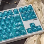 Stunning lake blue anime warrior artisan keycap set in detailed gallery views, highlighting heroic fantasy design and frosted PC accents for custom setup.