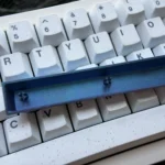 Vibrant collection of Premium Titanium Anna Yanami Anime Space key Keycaps, showcasing intricate character art and its sleek, polished titanium