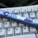 Premium Titanium Anna Yanami anime space key keycap 6.25U shown from multiple angles, highlighting vibrant character art and sleek, polished finish.
