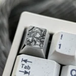 Premium Wuthering Waves: Galbrena Keycap, precision-engraved with intricate anime dot-art motifs for unparalleled keyboard artistry.