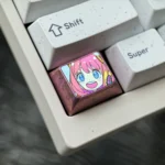 Gallery of the iconic Anya Forger titanium keycap, showcasing vibrant anime art on sleek, durable alloy from various angles, truly premium setup.