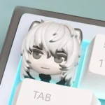 Charming handcrafted Arknights SilverAsh chibi keycap shown from multiple playful angles, highlighting its vibrant sculpted details.