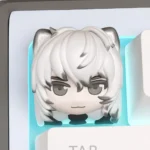 A charming, handcrafted Arknights SilverAsh chibi keycap, highlighting its intricate sculpted details and vibrant, playful aesthetic.