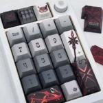 Close-up shots of the exclusive Arlecchino The Knave side-engraved keycap set, revealing the double-shot legends and dark, mysterious motifs from various angles.