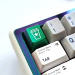 Playful Starbucks coffee cup artisan keycap, handcrafted from premium aluminum, a delightful pop culture keyboard accessory.