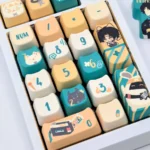 Exclusive Asaba Harumasa keycap set from multiple angles, highlighting the subtle anime-inspired character motifs and harmonious color palette.
