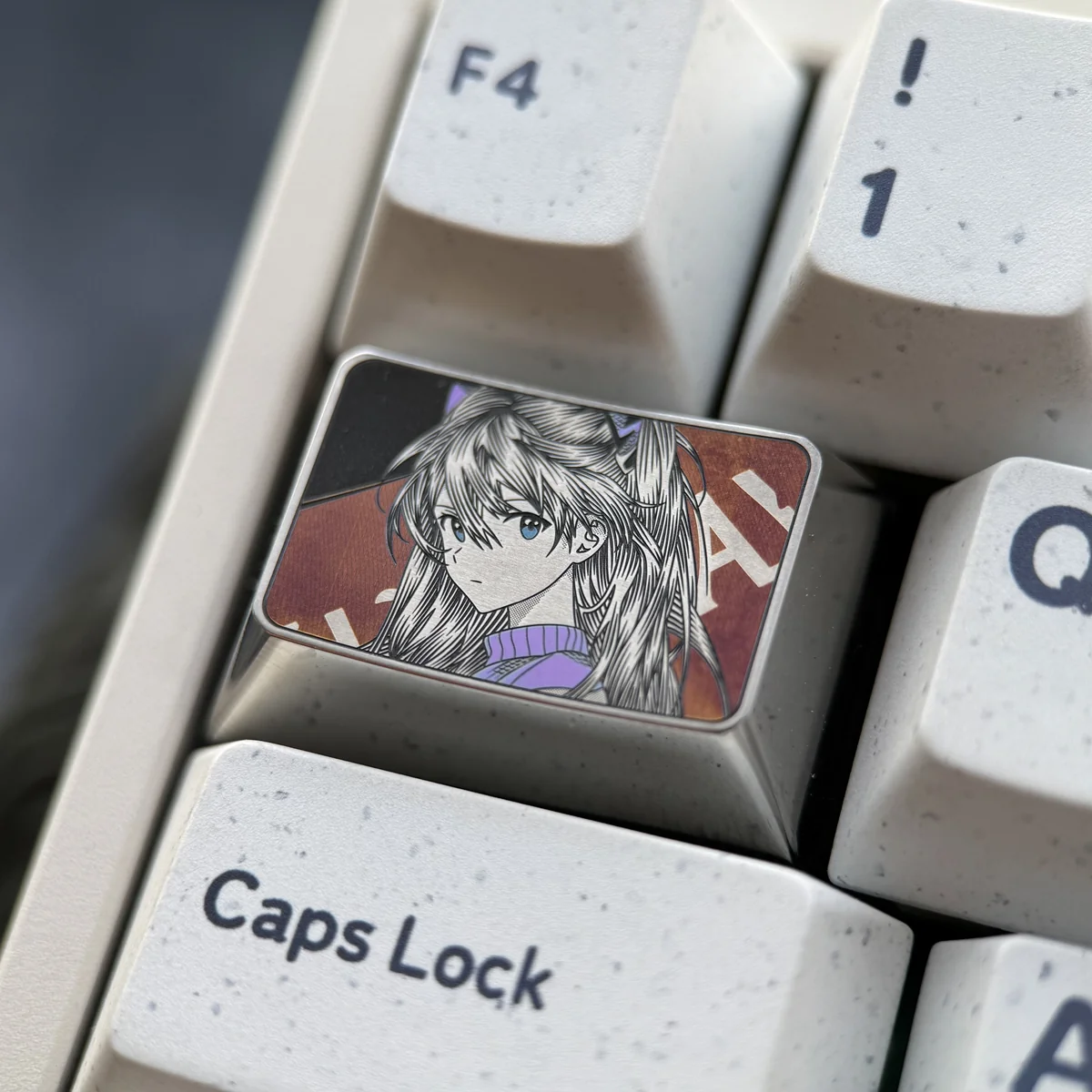 Gallery of the Iconic Asuka Keycap, highlighting bold anime character art, intricate precision engraving, and metallic sheen from various perspective angles.