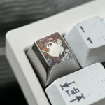 Precision-carved Asuka ESC keycap, intricate anime character design, and polished metallic finish. A premium fandom tribute.