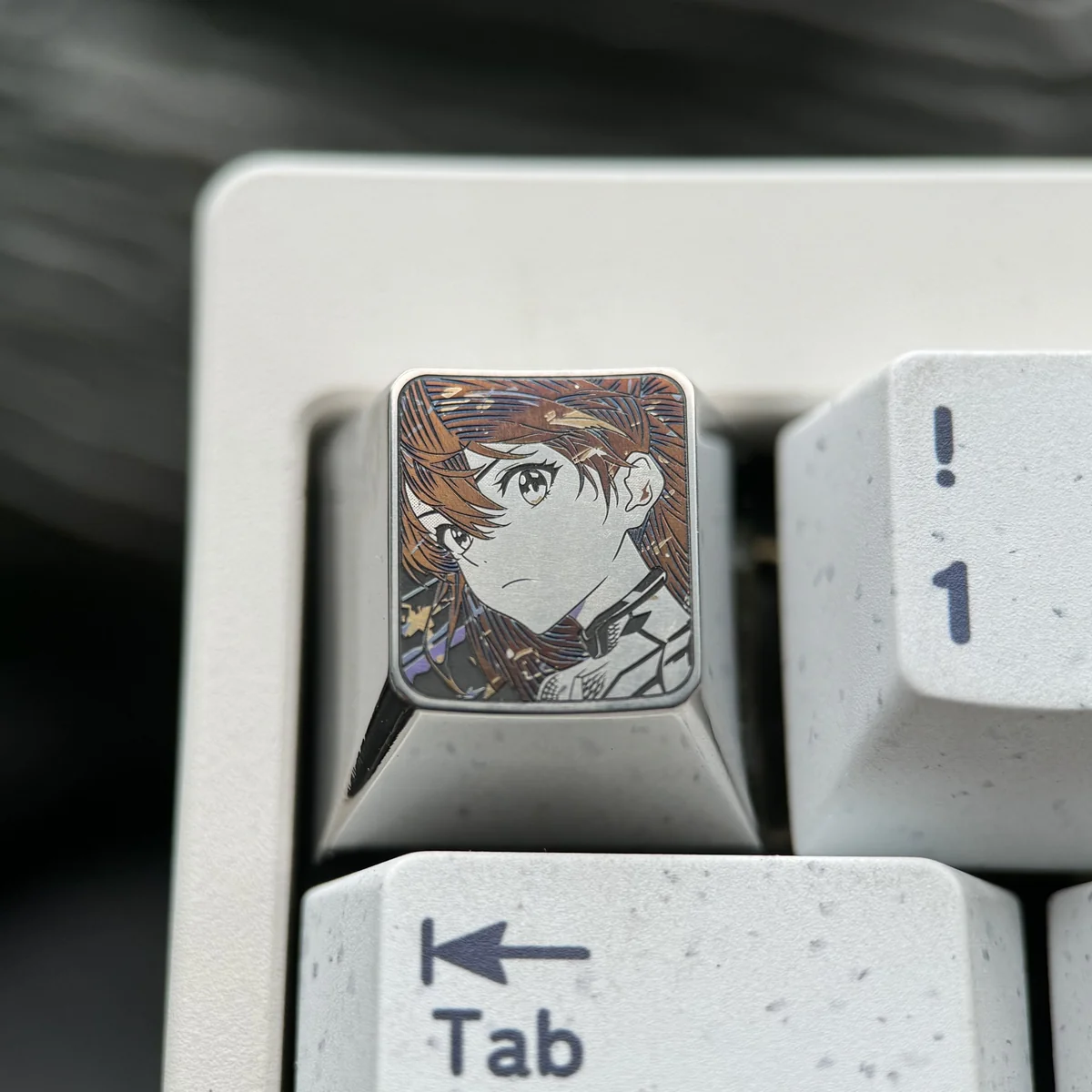 Premium precision-carved Asuka keycap showcasing intricate anime character design and polished metallic finish, an iconic fandom tribute..