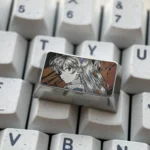 Asuka Keycap gallery: An Evangelion artisan tribute. This precision-engraved keycap reveals intricate metallic detail and the iconic character's design.