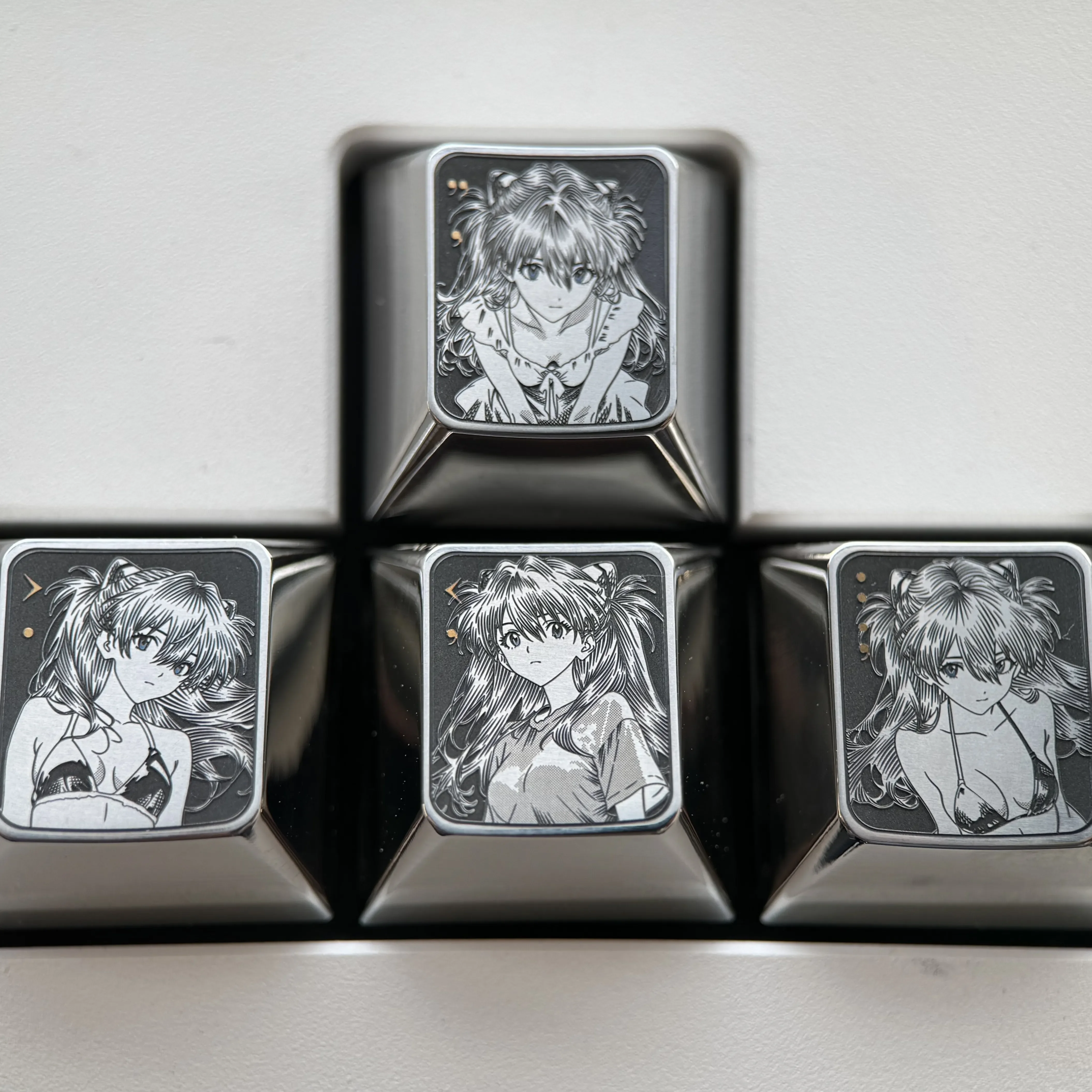 Main display of a precision-engraved Asuka titanium alloy keycaps, featuring vibrant sci-fi anime artistry for Evangelion enthusiasts.