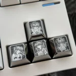 Precision-engraved Asuka titanium alloy keycaps for Evangelion fans, showcasing vibrant anime art with a stunning metallic sheen.