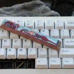 Asuka Titanium Keycap artisan space key product images, showcasing handcrafted deep red mecha artistry from various angles. Premium Evangelion design.