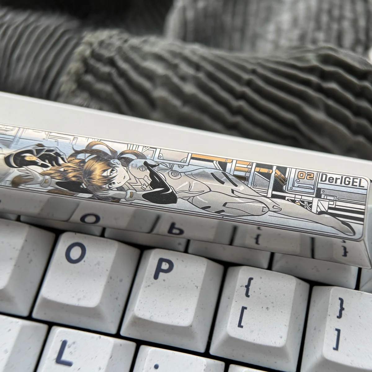 Asuka Titanium Keycap gallery featuring the precision-engraved spacebar with vibrant anime mecha details and durable titanium finish, shown from multiple angles.