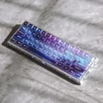 Frosted translucent Aurora Keycaps Set beautifully displayed from an artistic angle, showcasing their ethereal light-diffusing glow.