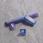 Aurora Keycaps set displayed from various angles, highlighting their ethereal frosted translucent design and vibrant light-diffusing capabilities.