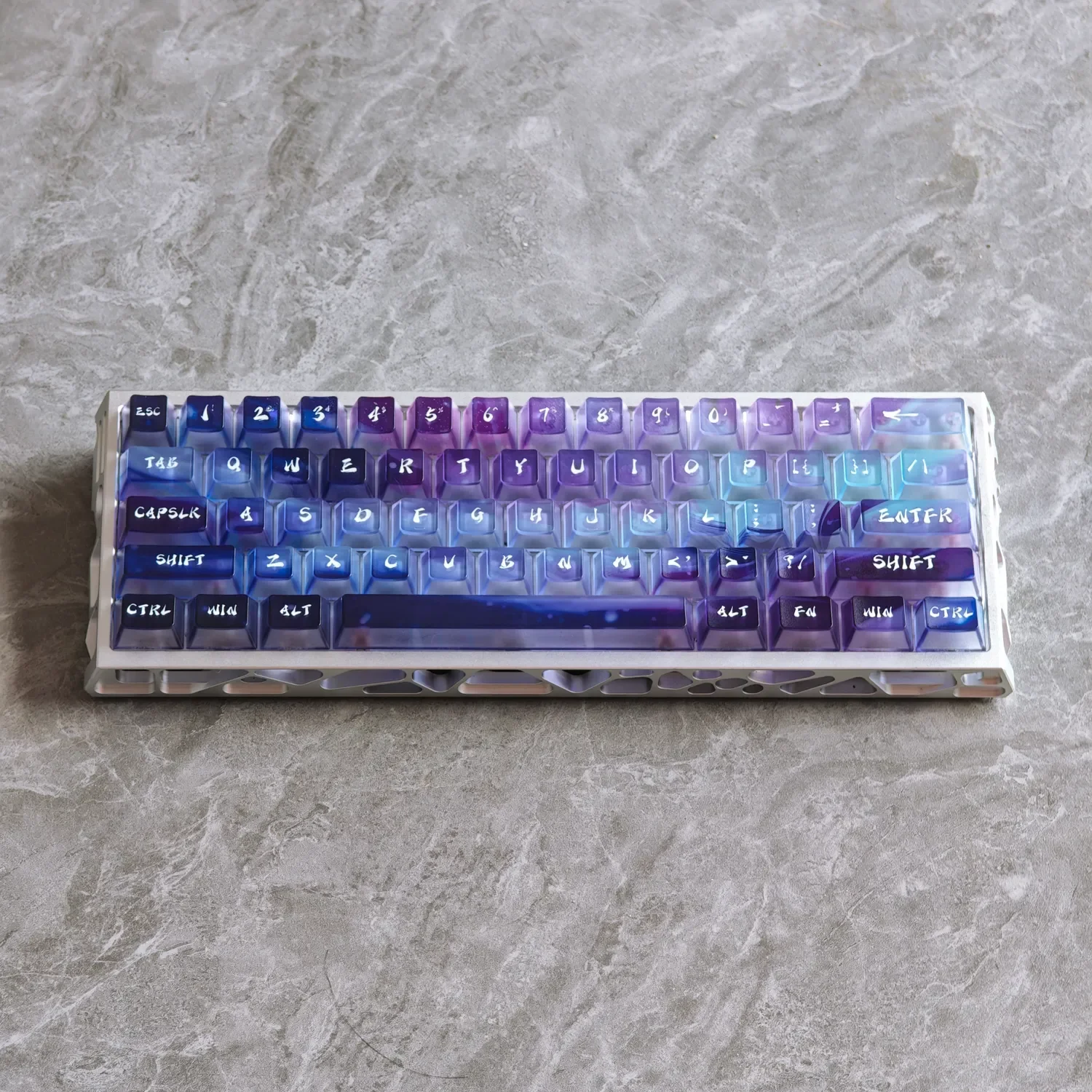 Captivating Aurora Keycaps set, showcasing frosted translucent keycaps with an ethereal light-diffusing aurora borealis glow, embodying modern design.