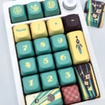 Aventurine FOA PBT Dye-Sub keycaps set, shown at an angle. Mystical green and gold flecks adorn the ergonomic sculpted FOA profile, creating an artistic keycaps.