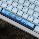 Multiple views of the custom Ayanami Rei Titanium Space key Keycap, highlighting the vibrant anime art and premium sci-fi design.