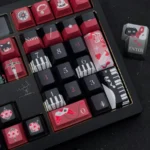 Ayn Keycap Set double-shot PBT keycaps, showcasing artistic side-printed legends from multiple angles for a clean, minimalist aesthetic design.