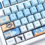 Close-up detail of Bai Qi PBT keycaps, showcasing the elegant Love & Producer character motifs and crisp, cool-toned dye-sub legends.