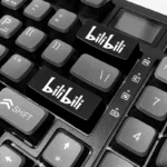 Dynamic views of the vibrant BiliBili RGB accent keycap, showcasing its iconic branding, vivid colors, and readiness for dazzling RGB lighting effects.