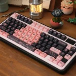 Premium Blackpink PBT dye-sub keycaps set, featuring bold black and pink artistic motifs. These exclusive Blackpink keycaps beautifully design.