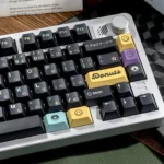 A vibrant product gallery showcasing the whimsical blueberry donut magnetic switch keycaps set, a sweet PBT dye-sub set perfect for Wooting keyboards.