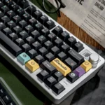 Explore various angles of the whimsical blueberry donut magnetic switch keycaps set, ideal for Wooting keyboards, featuring vibrant, sweet dessert setup.