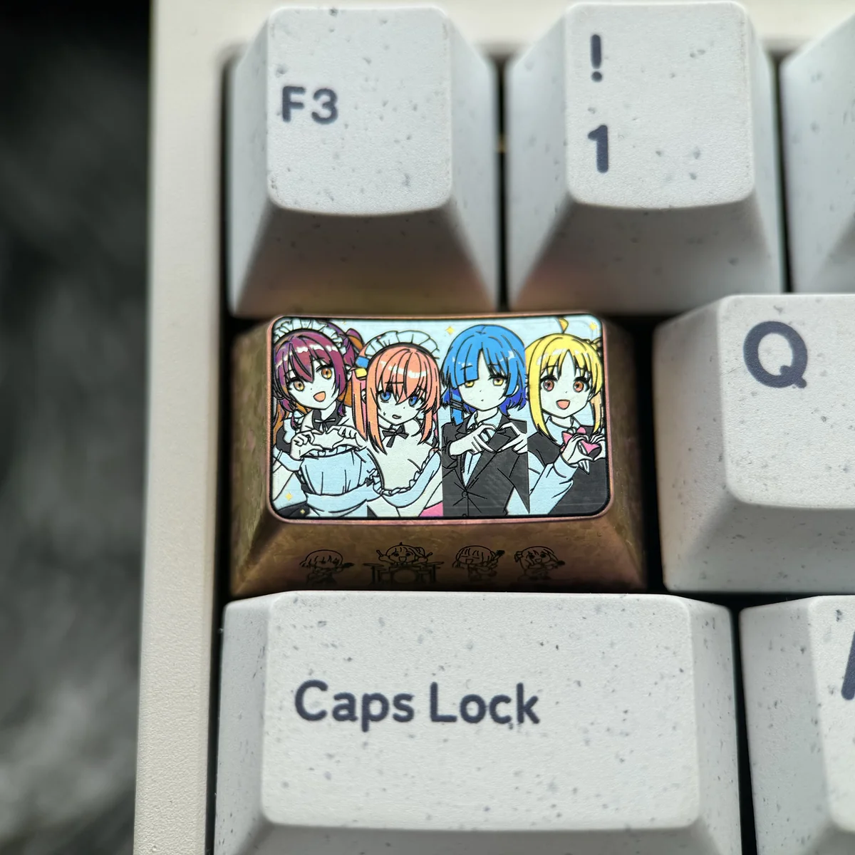 Premium Bocchi the Rock! titanium keycap gallery, showcasing exquisite vibrant anime art from multiple angles on sleek anodized metal.