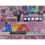 A collection of Bocchi the Rock! Kessoku Band PBT keycaps set, showcasing their vibrant anime designs and artistic character details.