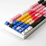 Vibrant Bocchi Keycaps set for mechanical keyboards, showcasing exclusive Kessoku Band PBT keycaps, anime characters, and band motifs from various design.