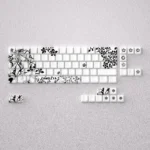 Elegant Camellya Keycap Setwith serene, gaming-inspired design on display. Perfect for 60% 65% keyboards, offering a premium, artistic aesthetic.
