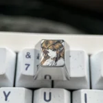 Cartethyia precision-engraved titanium anime keycap, an artisan ESC key showcasing intricate pointillism art of an anime character on polished titanium.