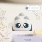 Playful handcrafted 3D cute cat artisan keycap for mechanical keyboards, showcasing its unique sculpted meow design.
