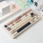 Whimsical Cat Keycap Set showing durable PBT dye-sub keycaps from multiple angles, highlighting charming cat illustrations in a cozy coffee and cream design.