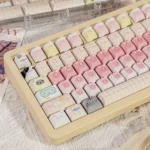 Adorable Cat Squad PBT dye-sub keycaps set in a full set gallery. Features pastel pink and mint green, playful cartoon cats.