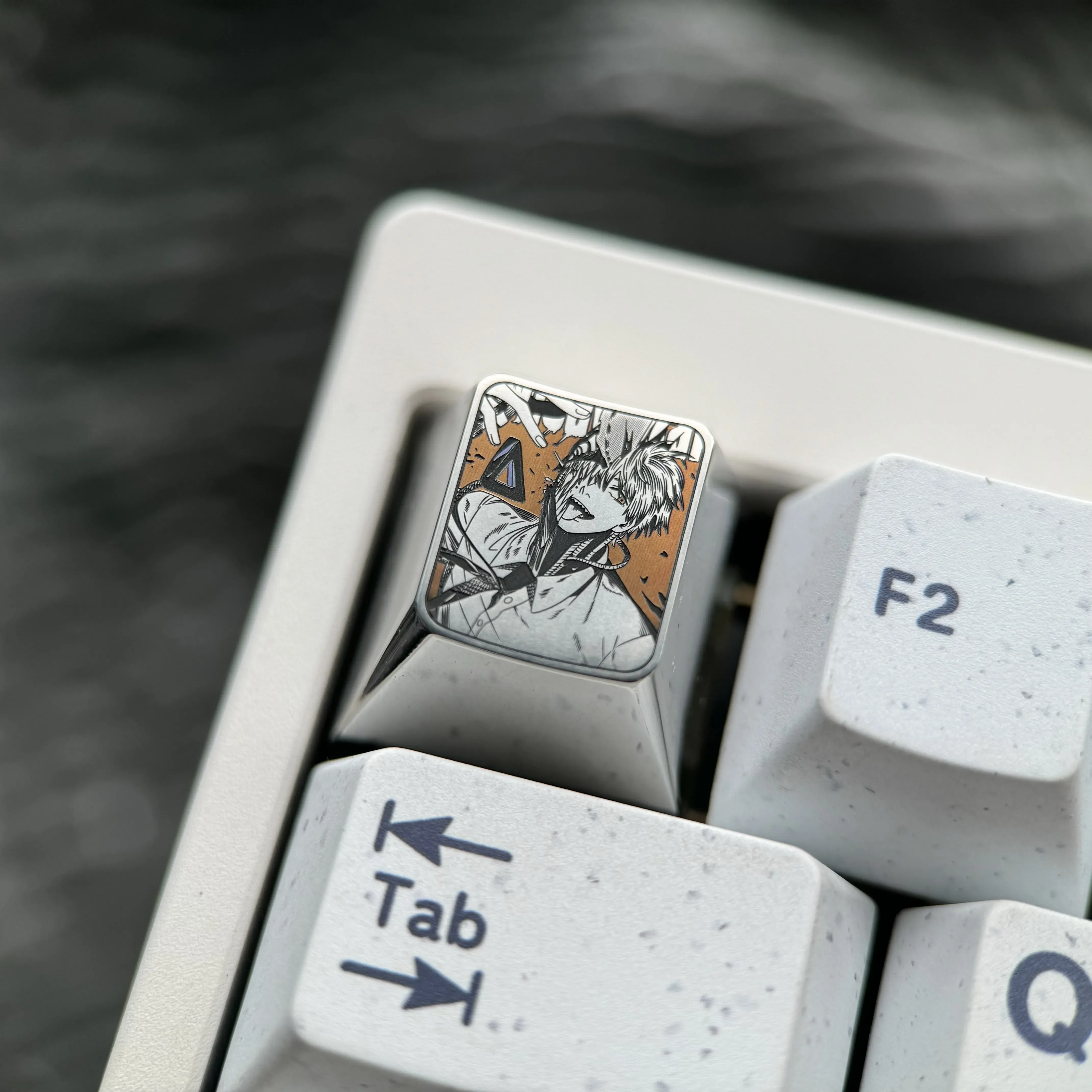 Chainsaw Man Denji titanium keycap gallery showcasing precision-engraved anime art, premium metallic craftsmanship from various artistic ESC angles.