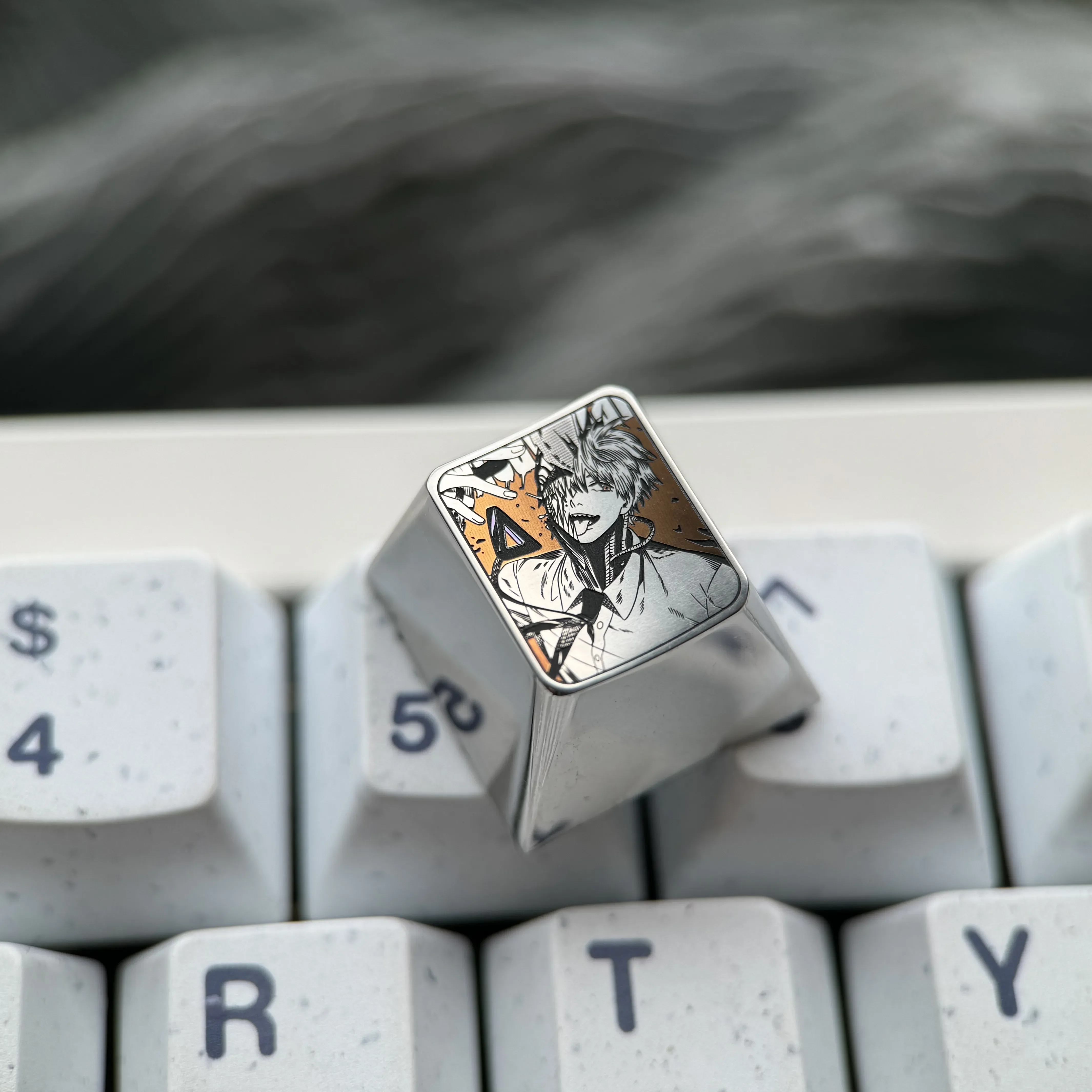 Chainsaw Man Denji titanium keycap gallery showcasing precision-engraved anime art and premium metallic craftsmanship from multiple angles.